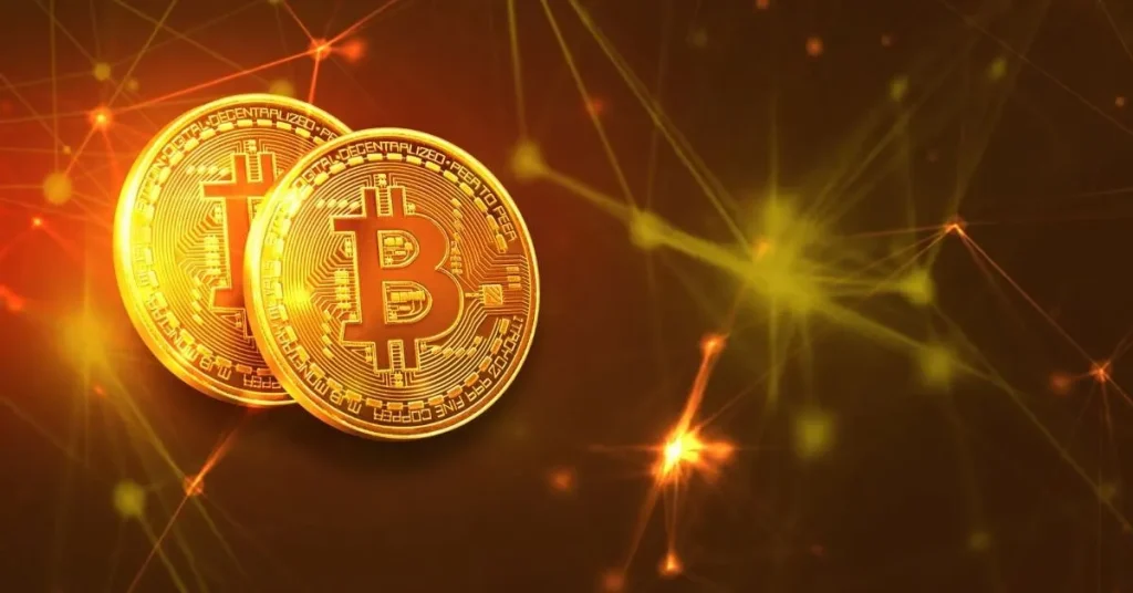 Two shiny golden bitcoins on a background of interconnected glowing lines and sparks, symbolizing digital currency and blockchain technology.