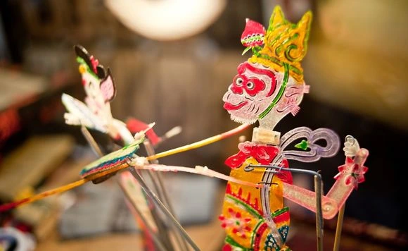 a close up of a toy skeleton on a stick